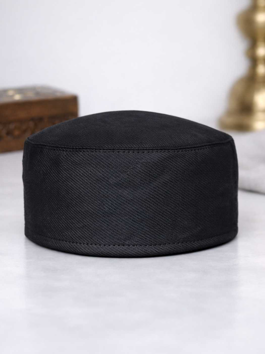 toosha plain black cap from Kashmir