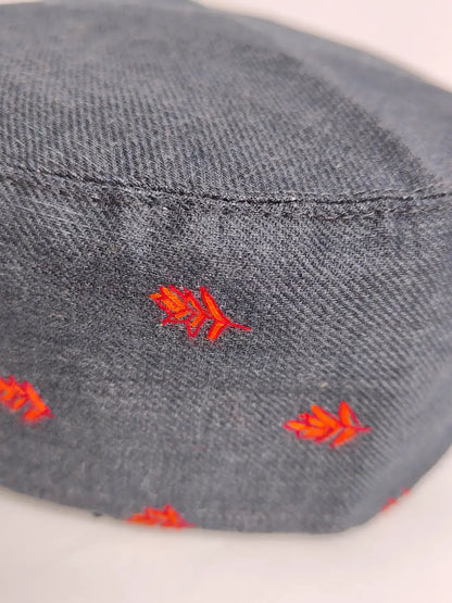 Kashmiri cap sozni embroidery against black