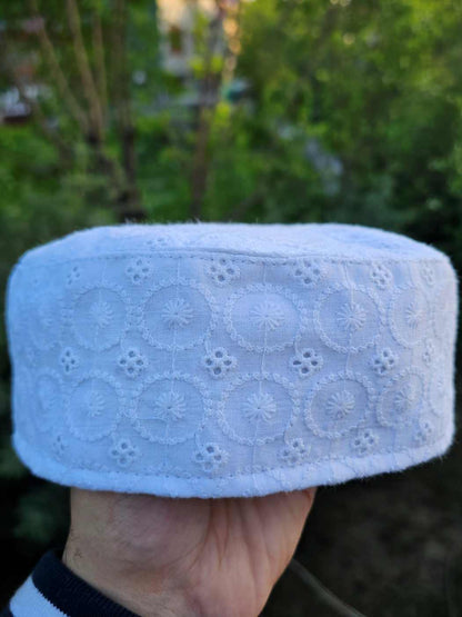 white hakoba pattern across sides of the Kashmiri summer cotton cap