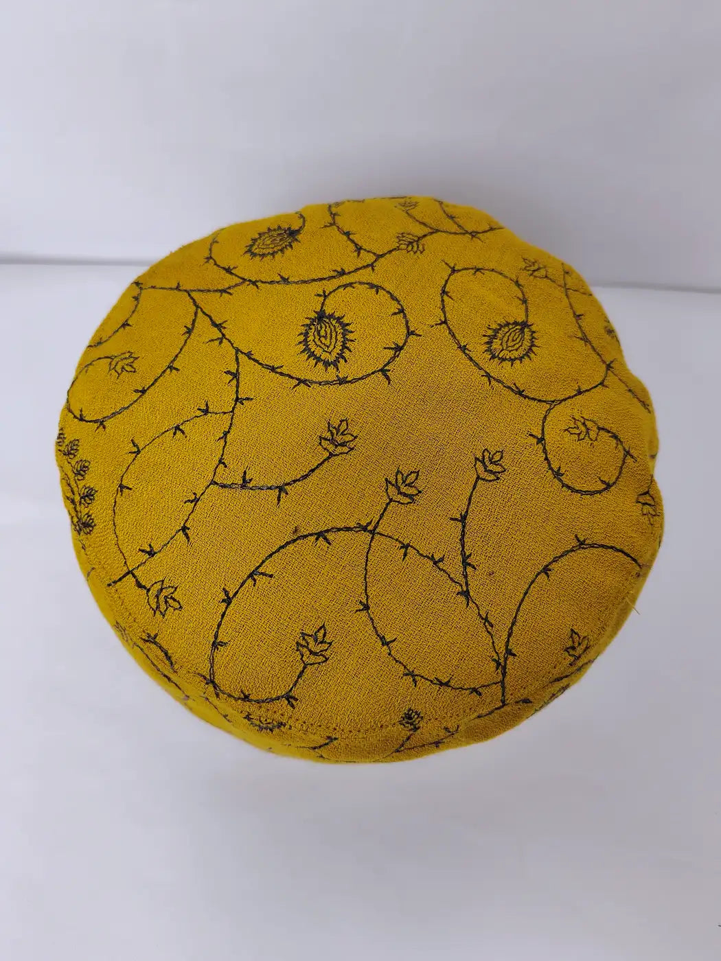 Kashmiri mustard cap top side